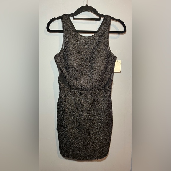 Adrianna Papell’s Hailey Logan Black Sleeveless Sheath Dress - Picture 1 of 4